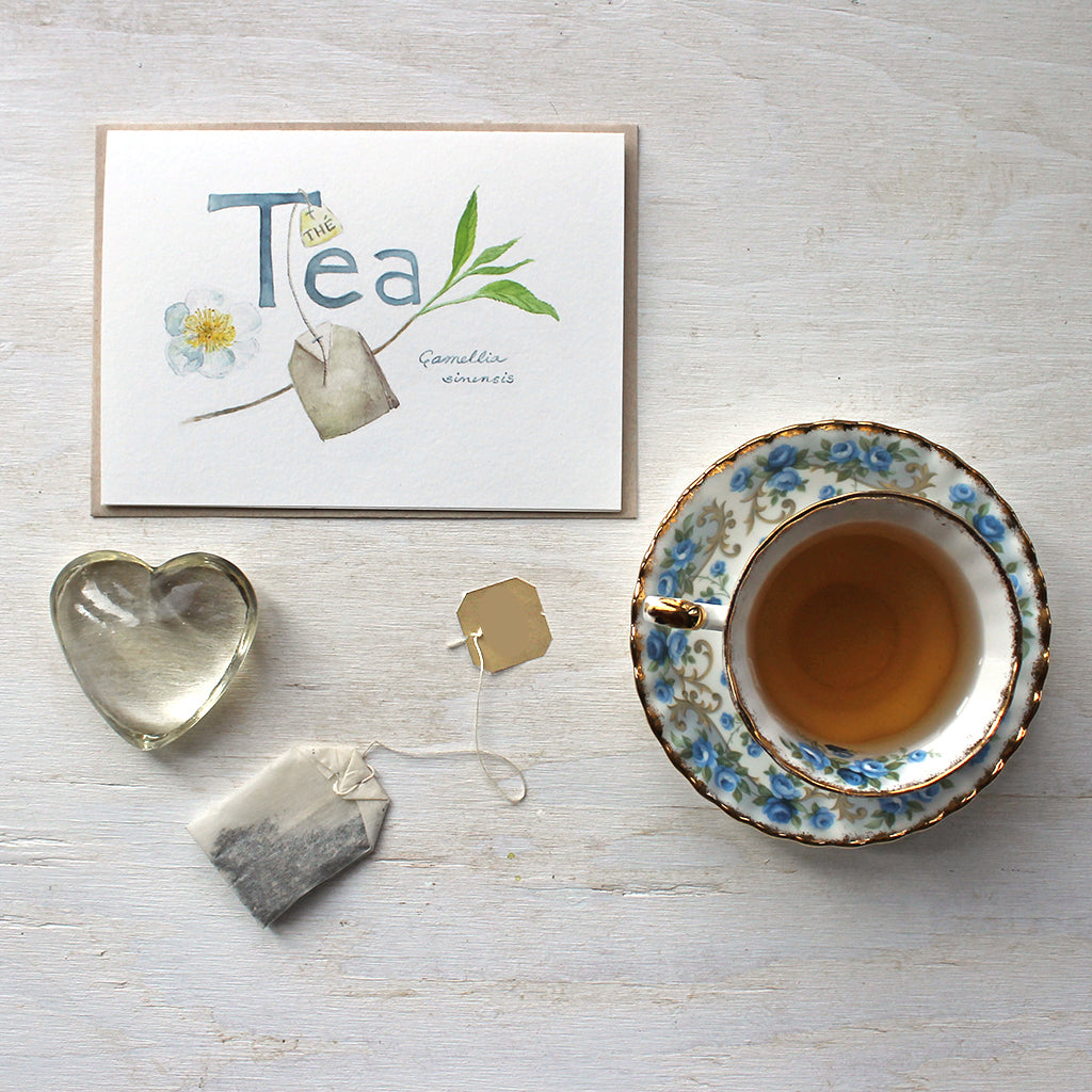 Note card featuring a botanical tea watercolor by Kathleen Maunder