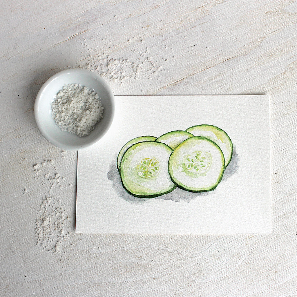 Art print of a watercolor painting of fresh cucumber slices. Artist Kathleen Maunder