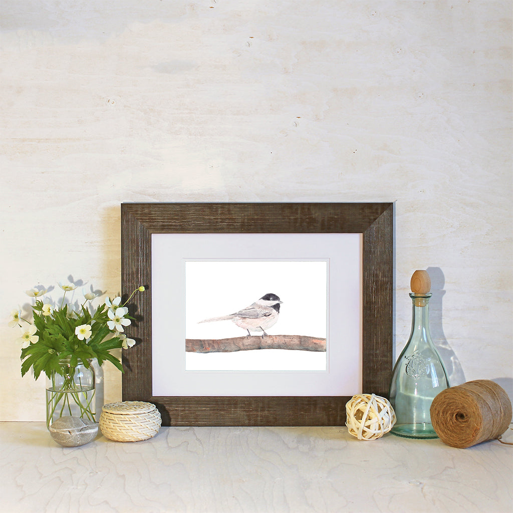 Framed chickadee watercolour print by Canadian artist Kathleen Maunder.