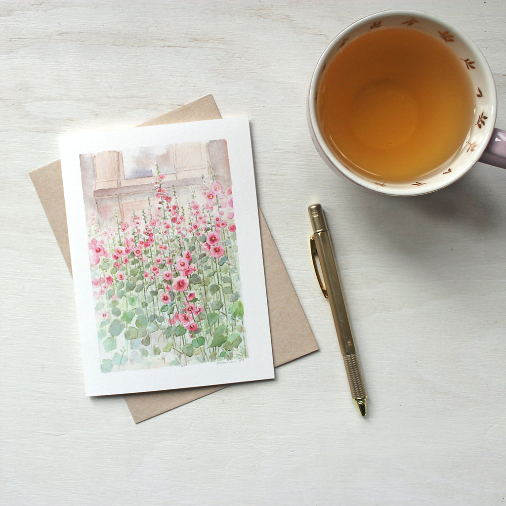 A hollyhocks note card and kraft envelope. Watercolor artist Kathleen Maunder.