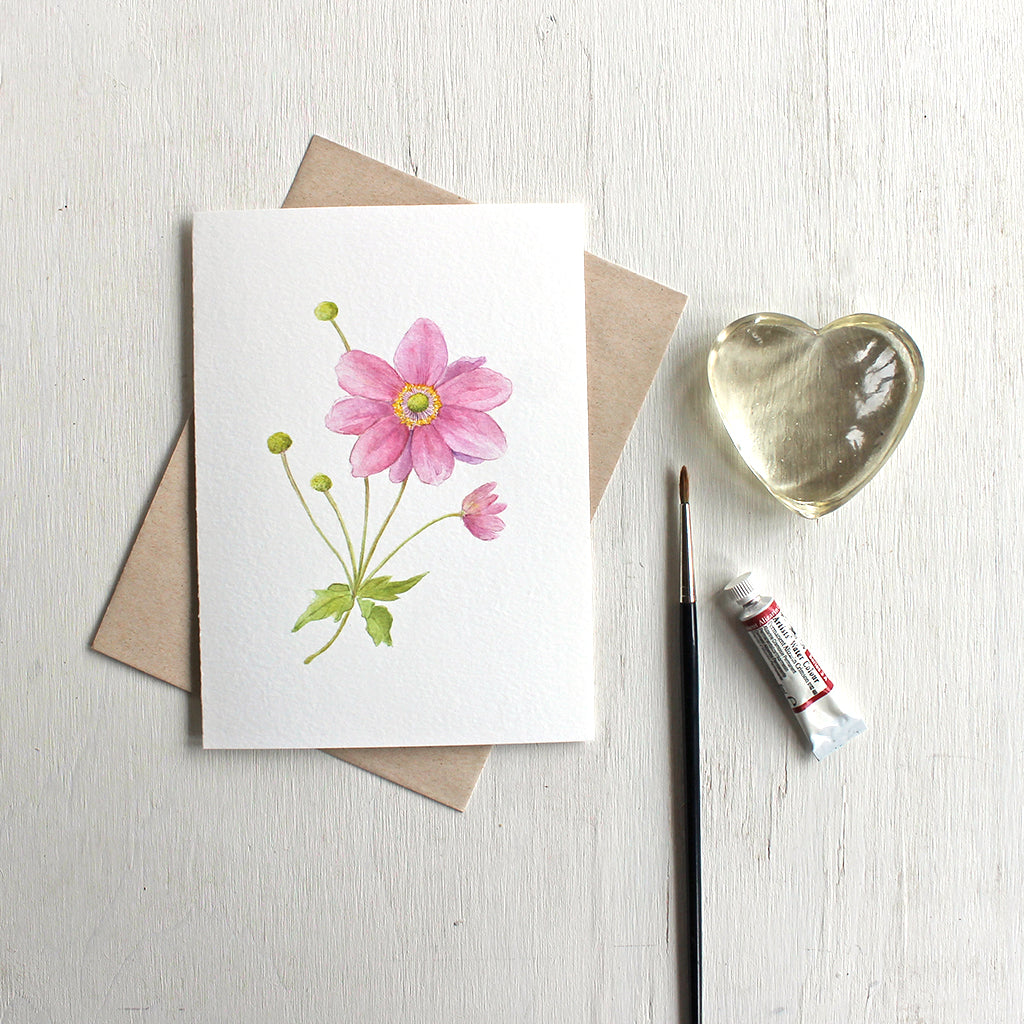 Pink Japanese anemone flower stem on note card. Watercolor artist Kathleen Maunder.