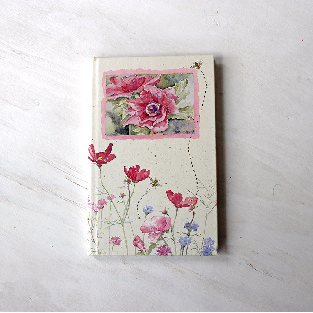 Vintage hardcover journal with ruled pages. The floral watercolor paintings on the cover are by Kathleen Maunder.
