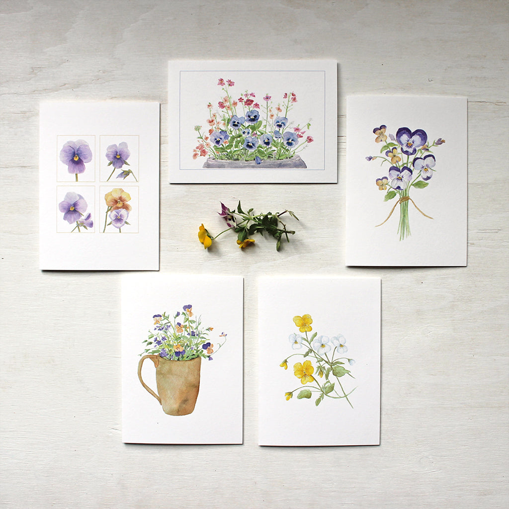 Assortment of five notecards with watercolour paintings of pansies and violas. Artist Kathleen Maunder.