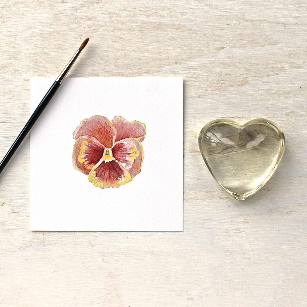 A lovely rust red pansy painted in watercolor. Available as an art print. Artist Kathleen Maunder.