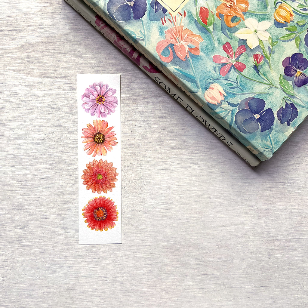 Floral bookmark featuring four colourful flowers by artist Kathleen Maunder