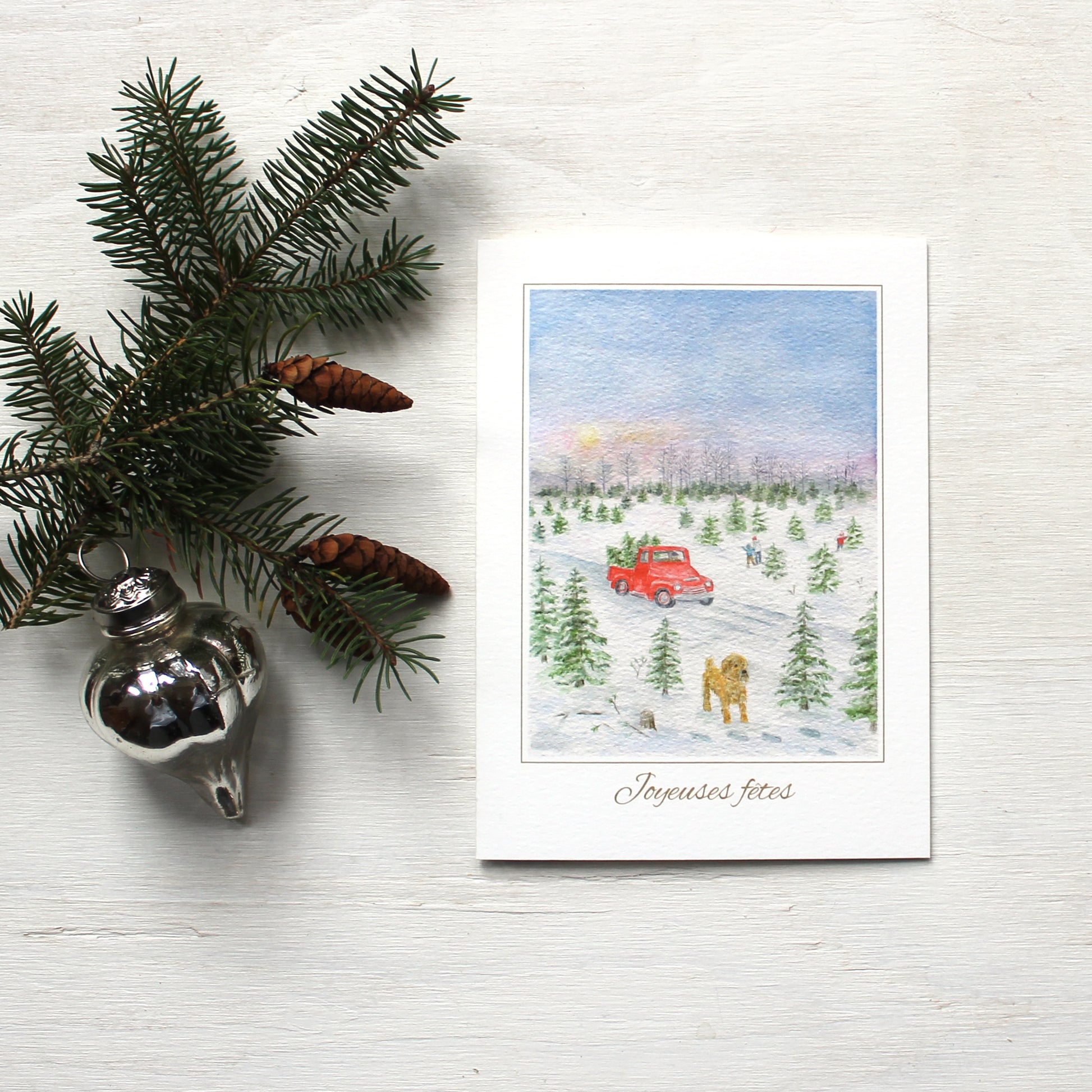 Carte de Noël - "Couper le sapin de Noël" avec une aquarelle par artiste-peintre Kathleen Maunder