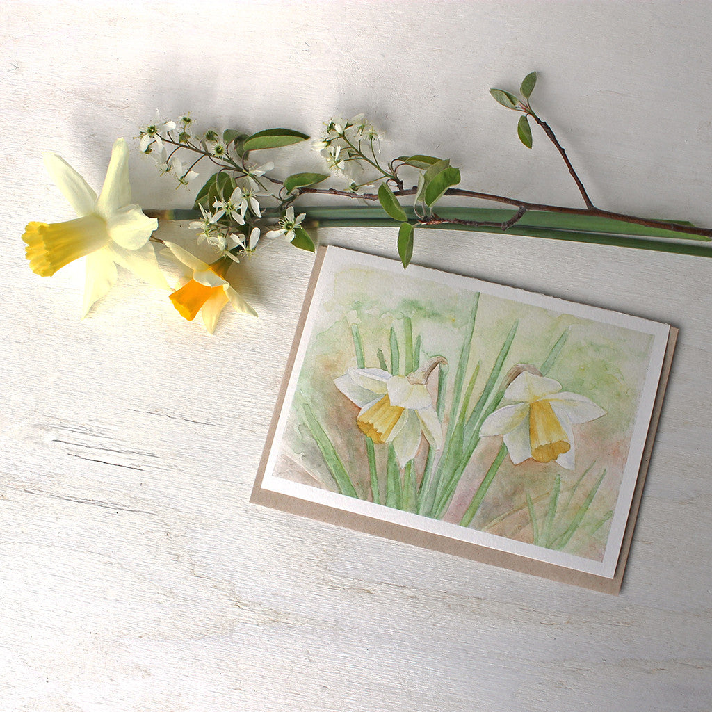 Blank note cards featuring a daffodil watercolor painting by Kathleen Maunder