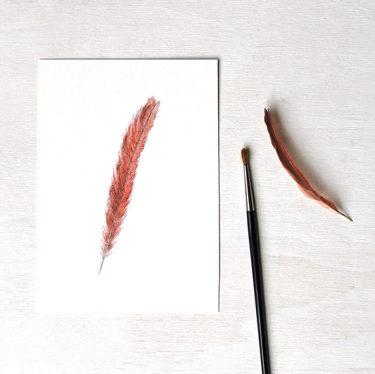 Art print featuring an original watercolor painting of a female cardinal tail feather by Kathleen Maunder.