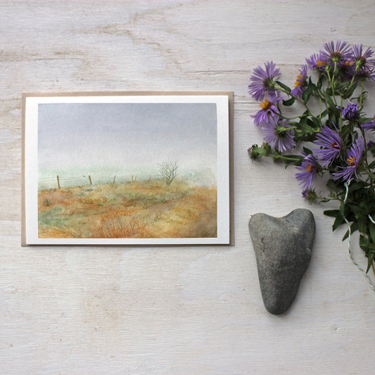 A note card featuring a lovely, moody watercolor painting of Haworth moor where the Brontë sisters used to walk. Artist Kathleen Maunder.
