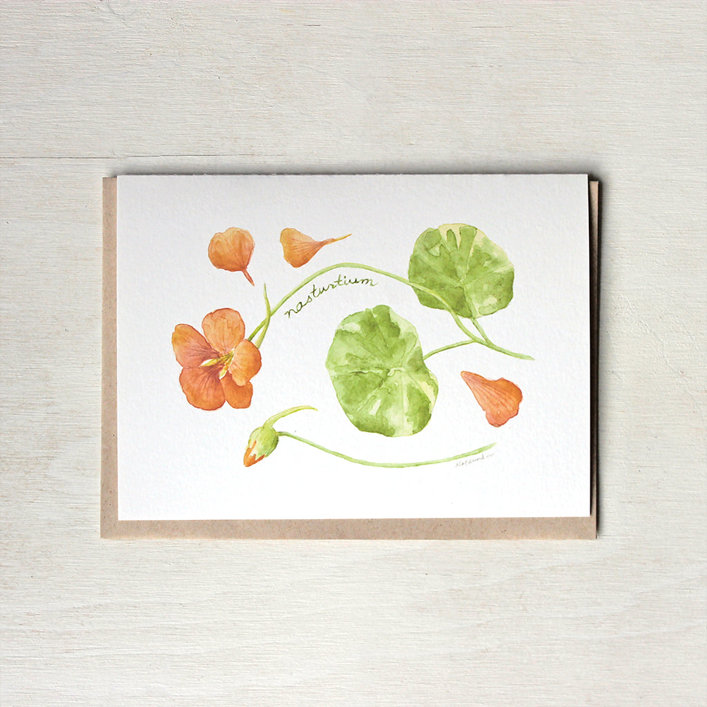 Watercolor painting of orange nasturtium flower and leaves available on note cards. Artist Kathleen Maunder.