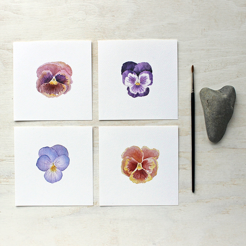 A collection of four lovely pansy watercolor prints by artist Kathleen Maunder.