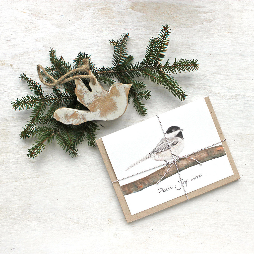 Set of Christmas cards with watercolor image of chickadee and 'peace love joy' greeting