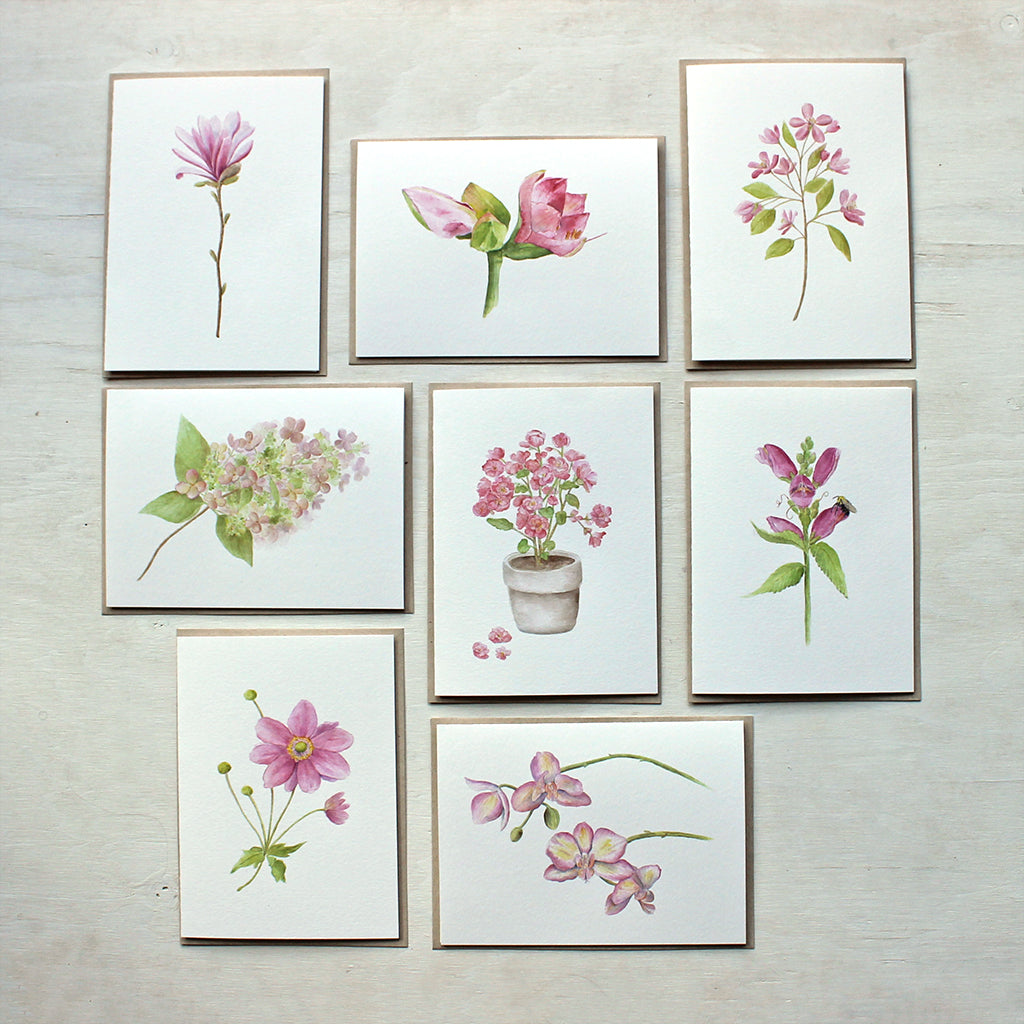 Set of eight note cards featuring pink flowers. Painted in watercolor by Kathleen Maunder.