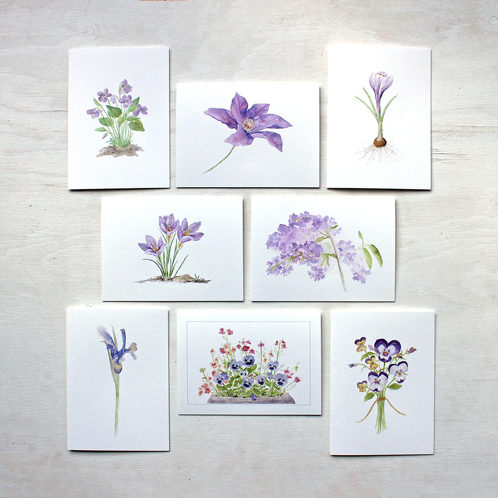 Set of eight note cards featuring purple flowers. Painted in watercolor by Kathleen Maunder.