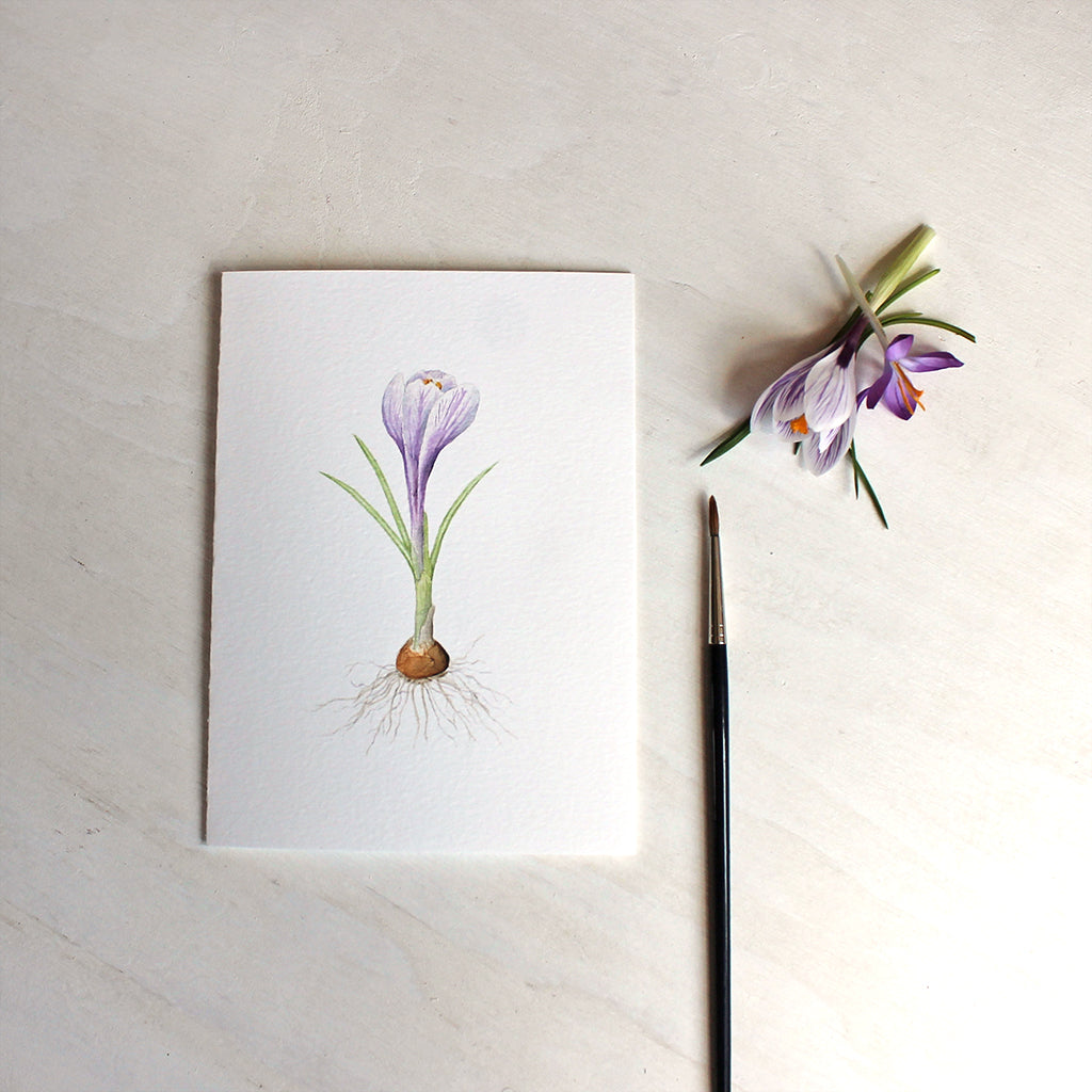 Note card featuring watercolor painting of a striped purple crocus bulb