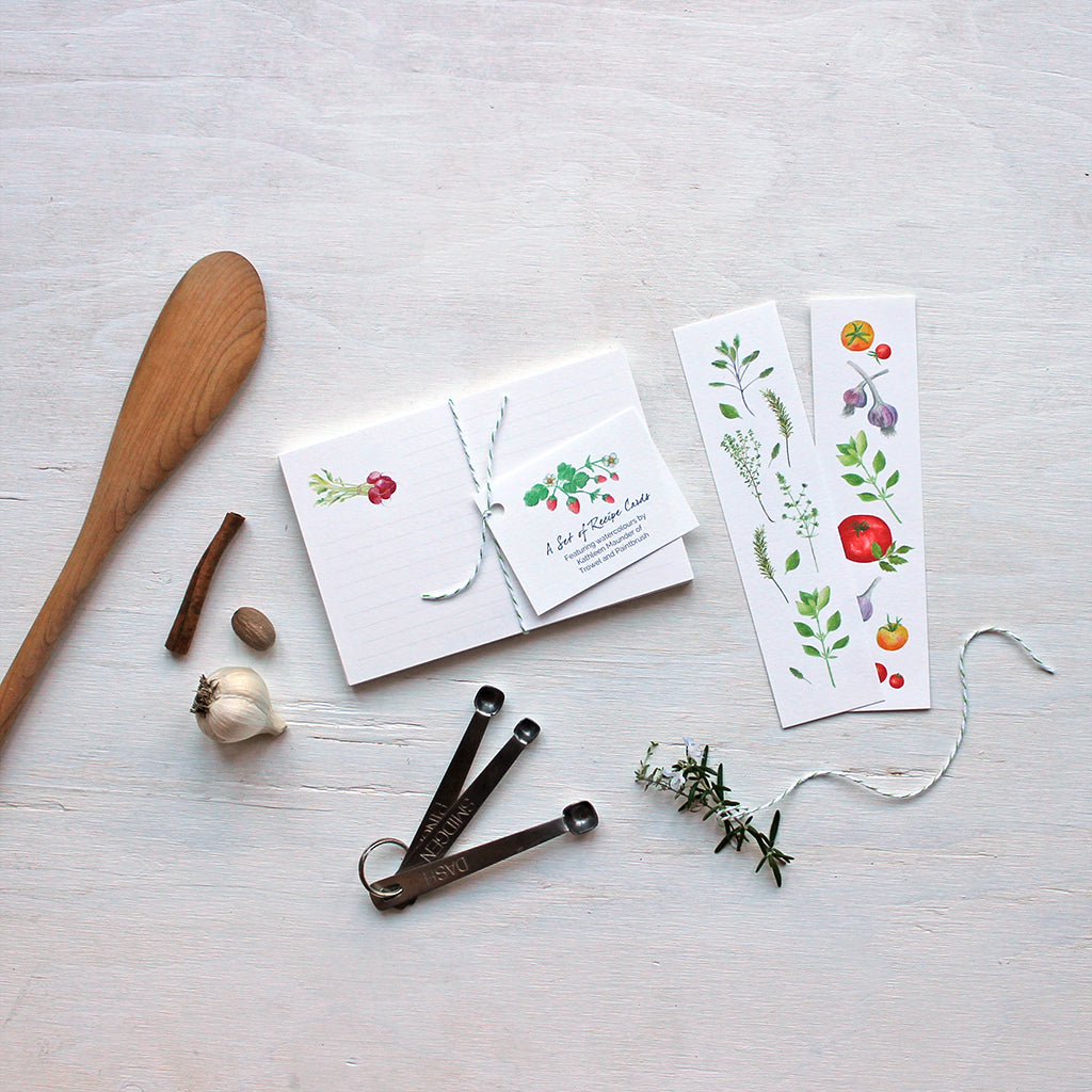 A set of 24 recipe cards and two bookmarks featuring watercolor images by Kathleen Maunder.