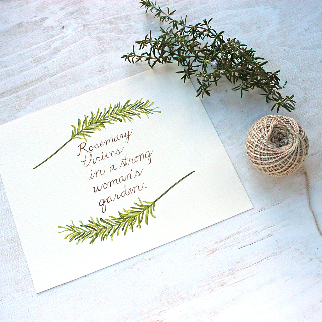 Rosemary thrives in a strong woman's garden - watercolor image and hand lettering by Kathleen Maunder