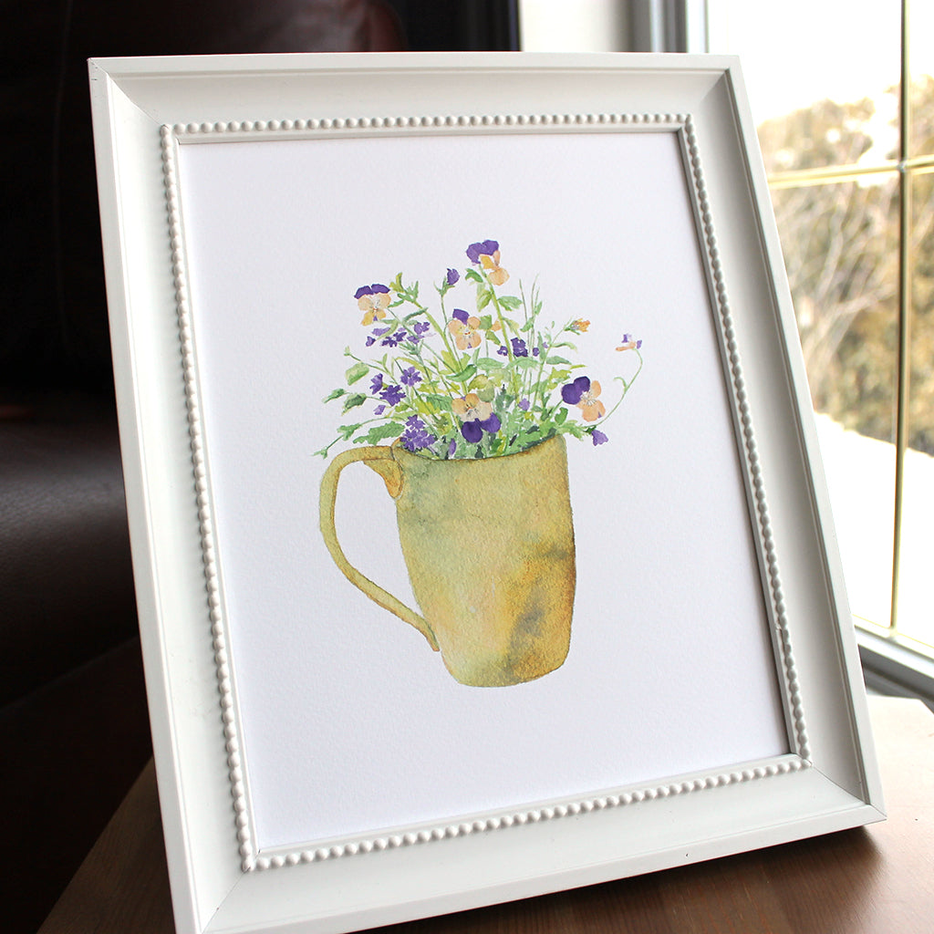 Art print of a lovely watercolor painting of violas and verbena in a ceramic mug. Artist Kathleen Maunder.