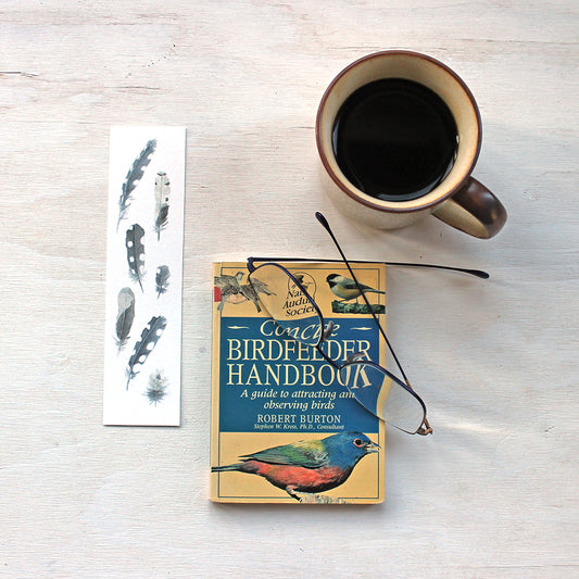 Bookmark featuring a painting of woodpecker feathers by watercolor artist Kathleen Maunder 