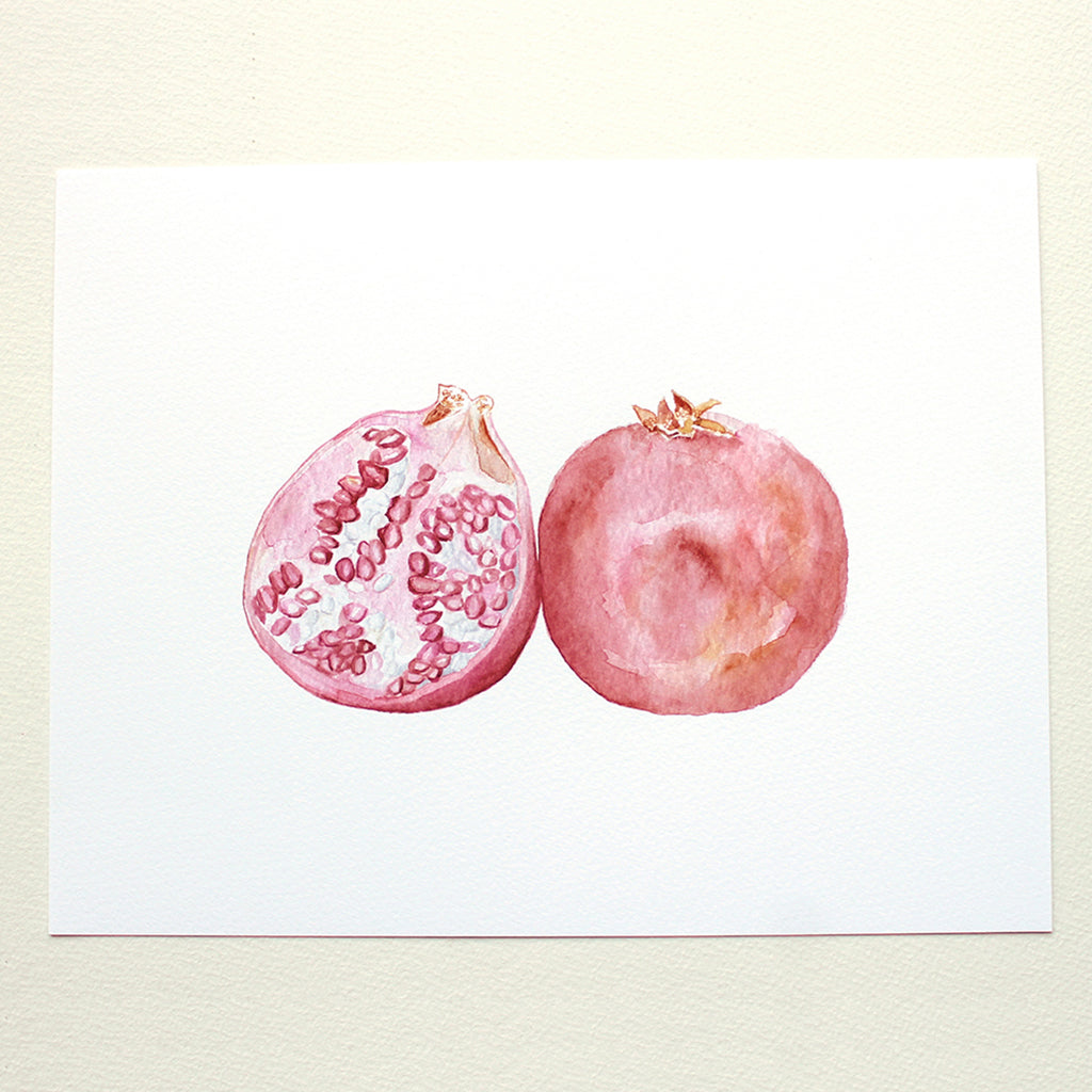 A watercolour art print of two beautiful pomegranates. Artist Kathleen Maunder.